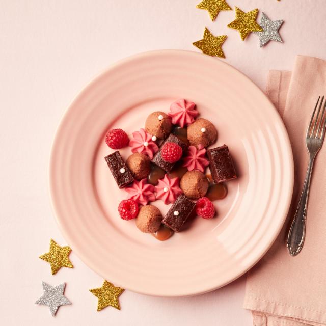 New Year dessert with chocolate and raspberry panna cotta